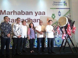 Standard Chartered jalin kerjasama strategis dengan Hong Kong Disneyland
